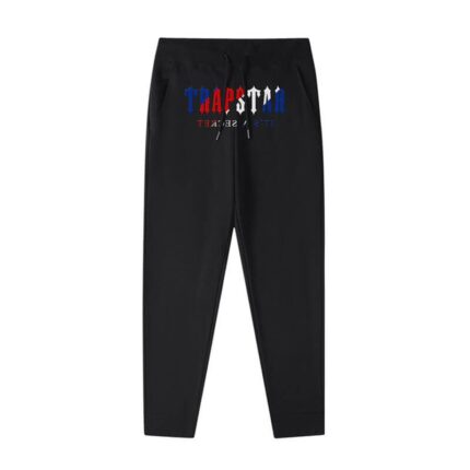 "Autumn Trapstar It's a Secret Logo Black Joggers - Elevate your fall wardrobe with these black joggers featuring the iconic Trapstar logo, combining comfort and style for the perfect autumn look."
