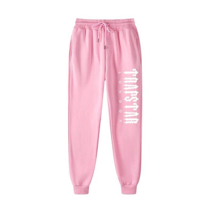 "Fleece Trapstar London Shining Pink Joggers - Infuse your street style with a playful touch in these cozy fleece joggers from Trapstar London, featuring a shining design and a vibrant pink hue."