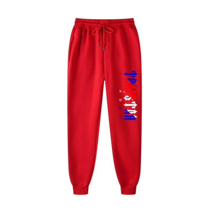 "Fleece Trapstar London Shining Joggers - Red - Make a bold statement with these cozy fleece joggers from Trapstar London, featuring a vibrant red hue and a shining design for an eye-catching urban look.