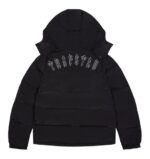 Trapstar Black Irongate Jacket with Detachable Hood - A versatile and stylish black jacket featuring a detachable hood for urban fashion enthusiasts."