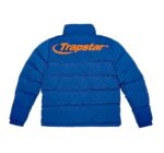 "Eye-catching Trapstar Blue/Orange Hyperdrive Bomber Jacket, a fusion of style and sportiness in striking blue and orange hues."