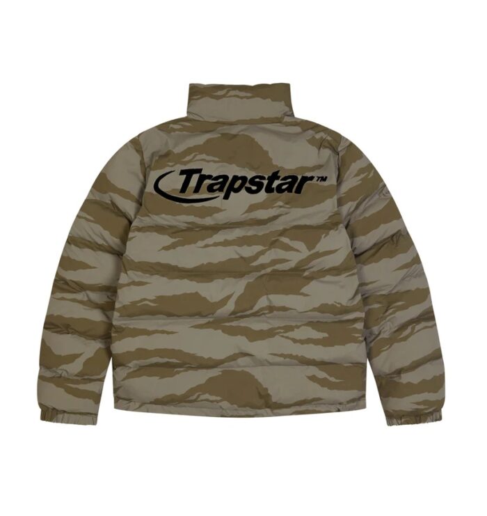 Trapstar Tiger Camo Hyperdrive Puffer Jacket - A bold and stylish statement piece for your winter wardrobe. Featuring a striking tiger camo pattern, this jacket is designed to keep you warm and fashionable. The hyperdrive technology provides superior insulation, perfect for the coldest days. With a sleek and modern design, it's a must-have for those who love streetwear fashion."