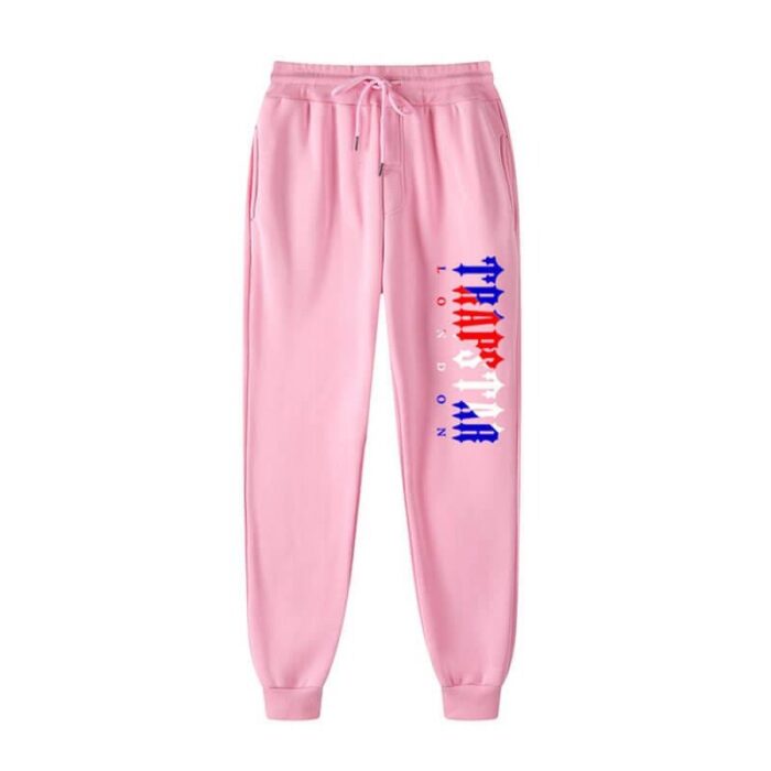 "Fleece Trapstar London Shining Joggers - Pink - Add a pop of color to your streetwear wardrobe with these cozy fleece joggers from Trapstar London, featuring a shining design for a playful urban touch."