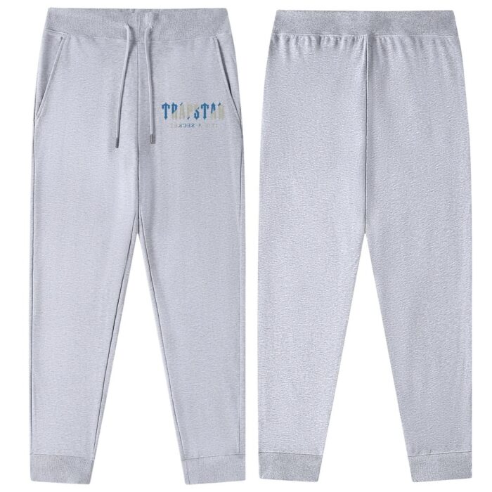 "Autumn Trapstar It's a Secret Gray Joggers - Embrace the autumn chill in style with these cozy gray joggers from Trapstar's exclusive collection, perfect for a comfortable and fashionable fall look."